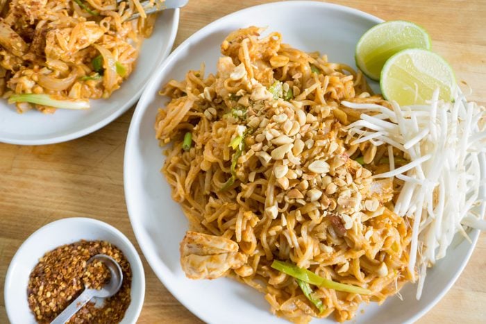 Chicken Pad Thai Plated on Wooden Surface