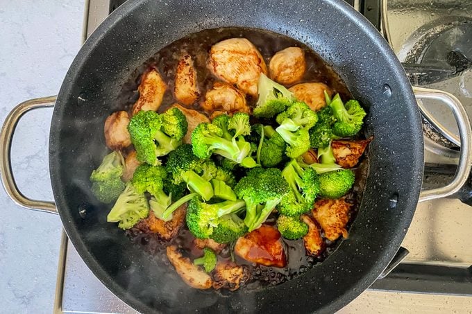 Cooking Chinese Chicken And Broccoli in Pan