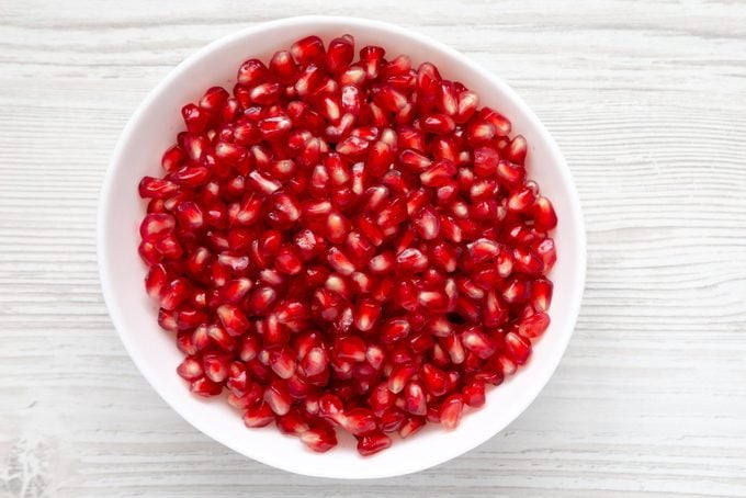 Red Pomegranate Seeds in a Bowl