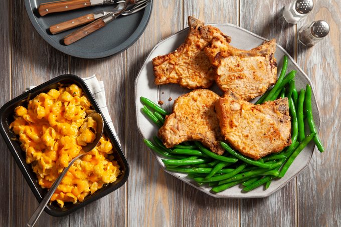 Southern Fried Pork Chops with cheese macaroni.