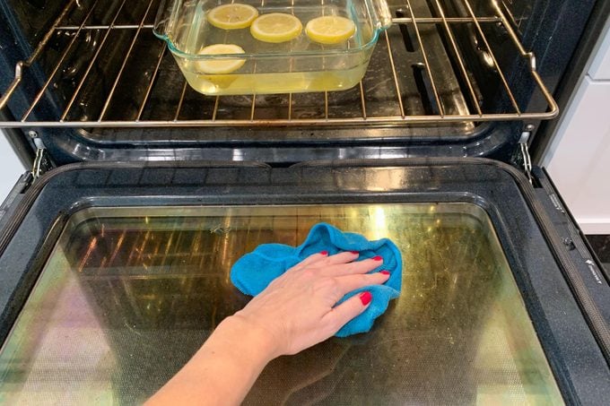 Wipe the oven with a blue rag