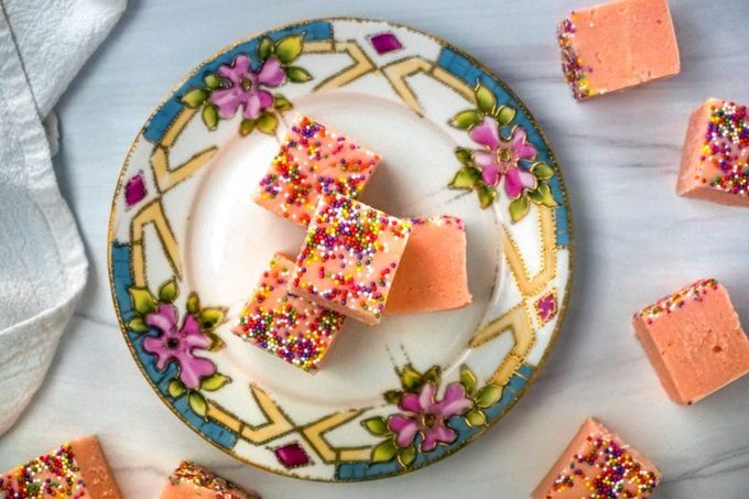 Cubes of Pink Lemonade Fudge with Sprinkles in a Pretty Plate