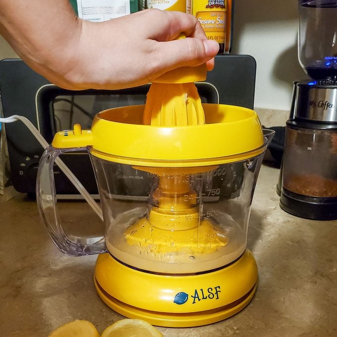 Extracting Lemon Juice with Electric Proctor Silex Juicer