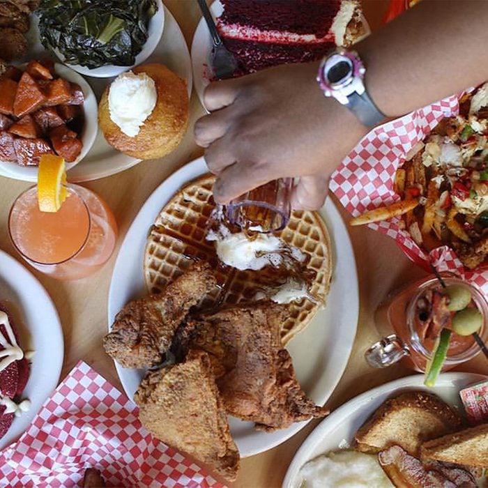 A spread of soul food from Lolos Chicken And Waffles