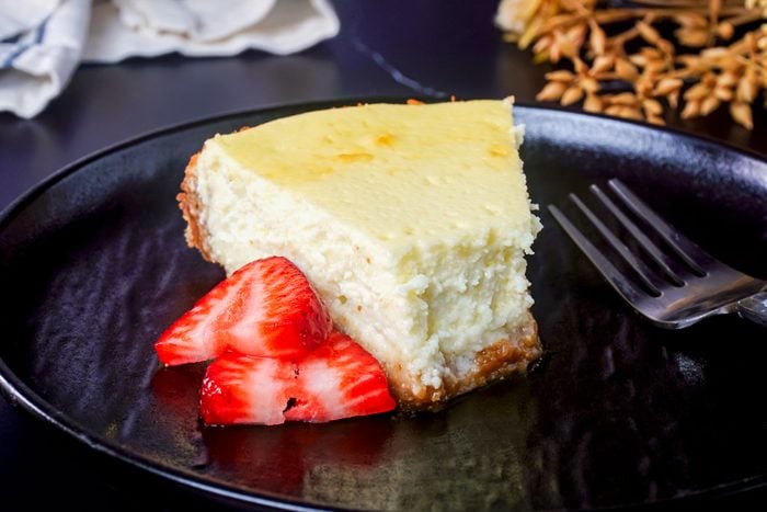 Cottage Cheese Cheesecake Served in a Plate with Sliced Strawberries