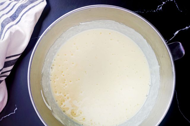 smooth and creamy cheesecake batter in a mixing bowl