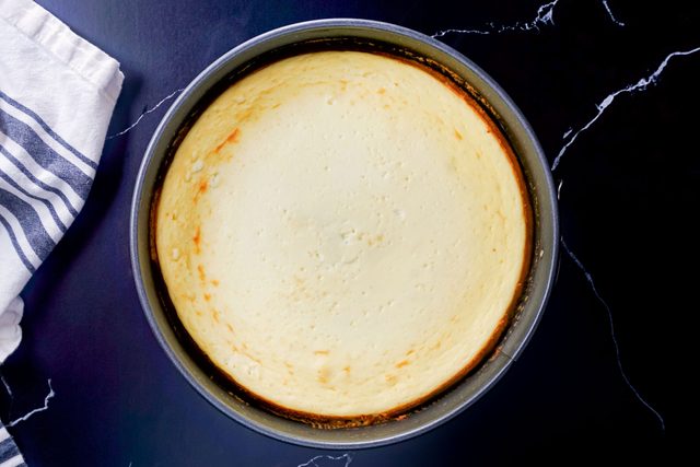 freshly baked cottage cheese cheesecake in a pan