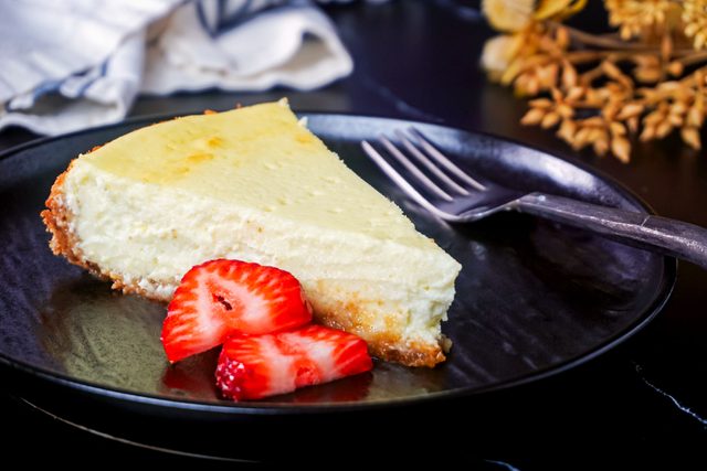 Cottage Cheese Cheesecake Served in a Plate with Sliced Strawberries