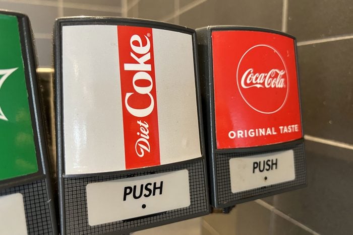 Mcdonalds Soda Fountain with Coca Cola and Diet Coke Visible at a McDonalds Restaurant
