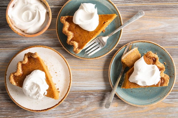 Baked pumpkin pie with whipped cream