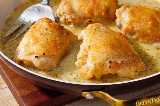 Cooked smothered chicken in pan