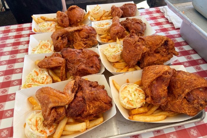 Fried Chicken with fries served in cardboard containers