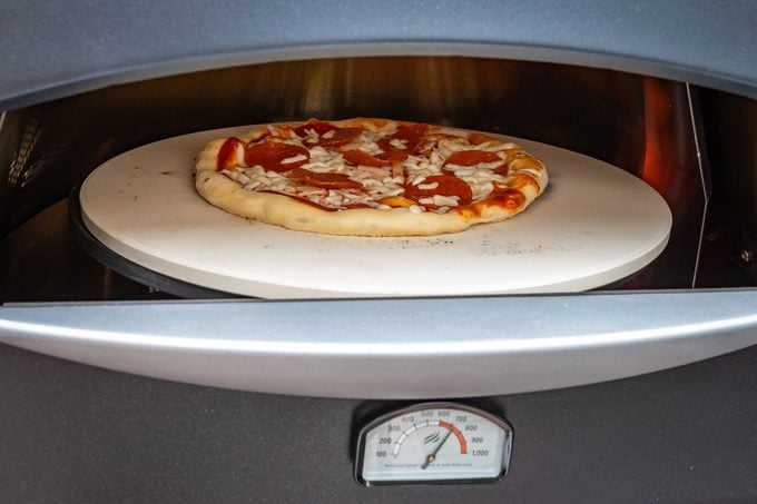  Baking Pizza in Blackstone Pizza Oven 