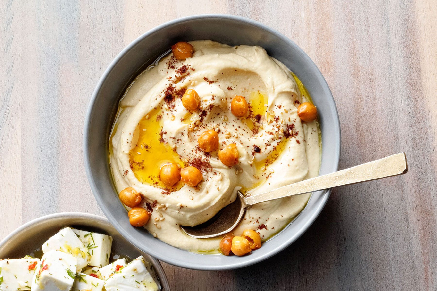 Fresh Hammus with chickpeas in a small bowl