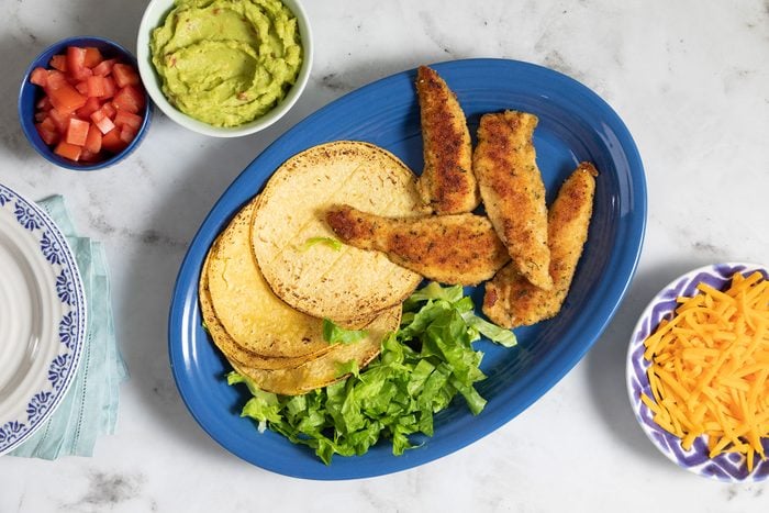 Fried Chicken with Tacos, lettuce and guacamole