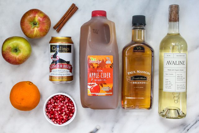Ingredients for Apple Cider Sangria on Marble Slab