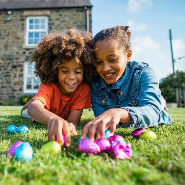 Two Kids Playing With Easter Eggs