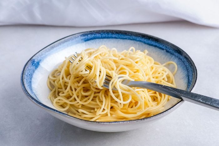 Spaghetti Pasta in Ceramic Plate with Fork, Does The Cold Water Pasta Hack Work?