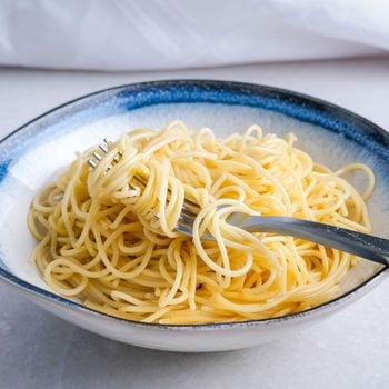 Spaghetti Pasta in Ceramic Plate with Fork, Does The Cold Water Pasta Hack Work?