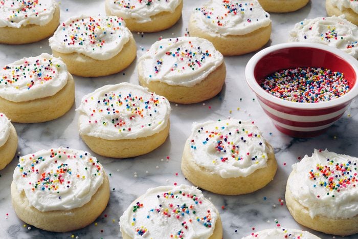Frosted Sugar Cookies decorated with sprinkles on top