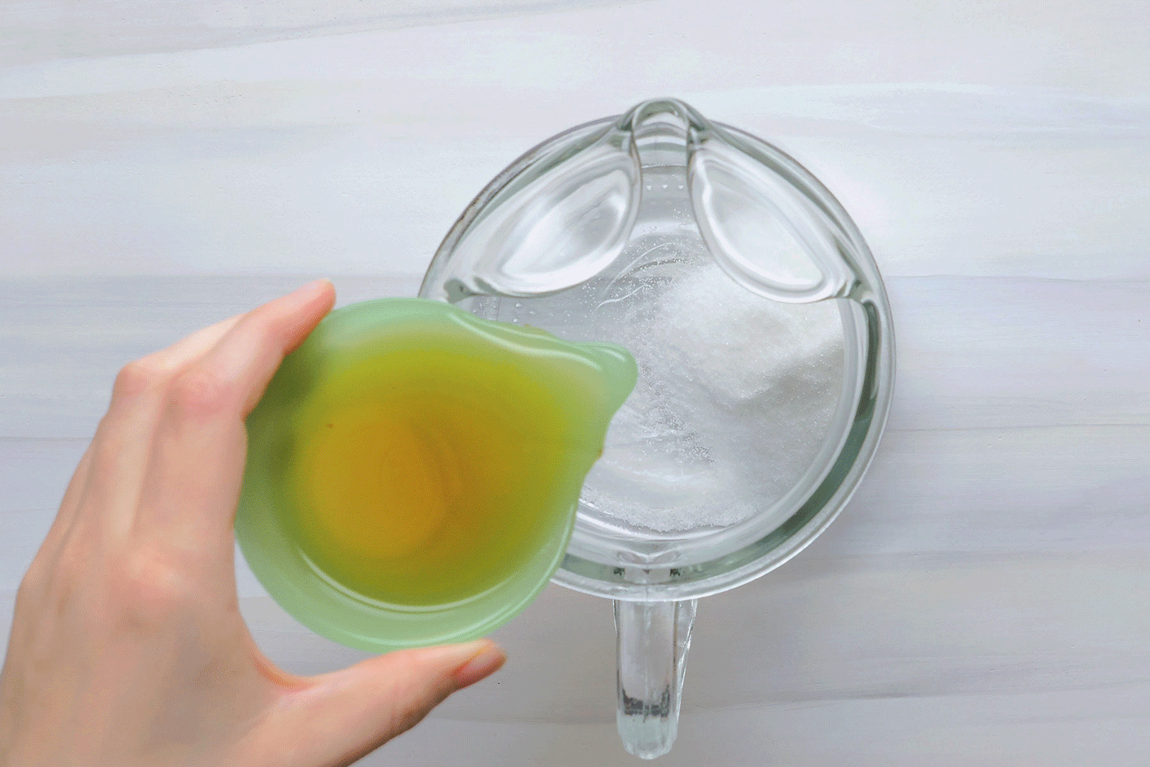 Adding lemon juice to jug