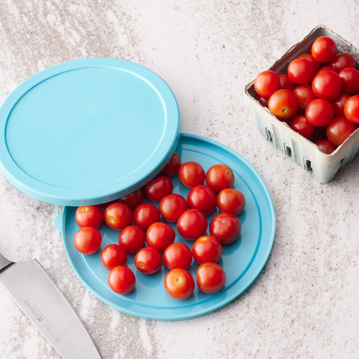Tomatoes between plates