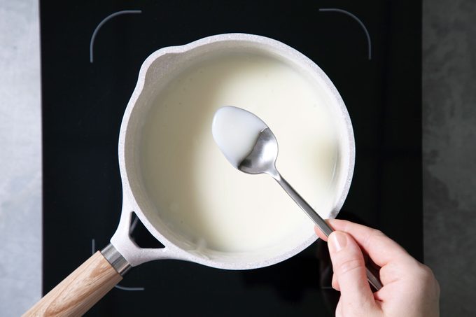 checking cream with spoon 