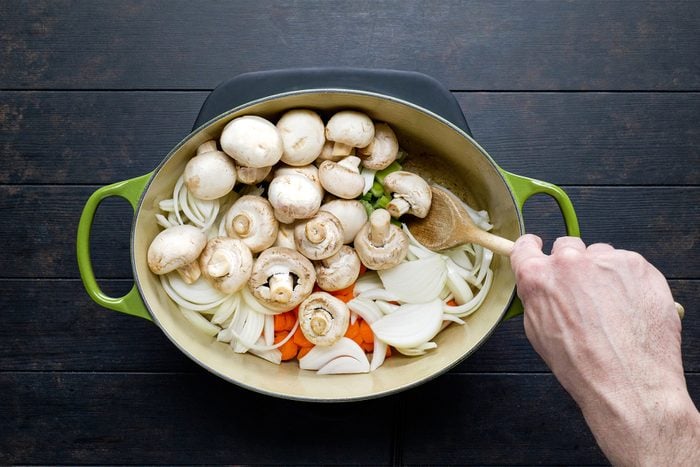 A pot of mushrooms and onions 