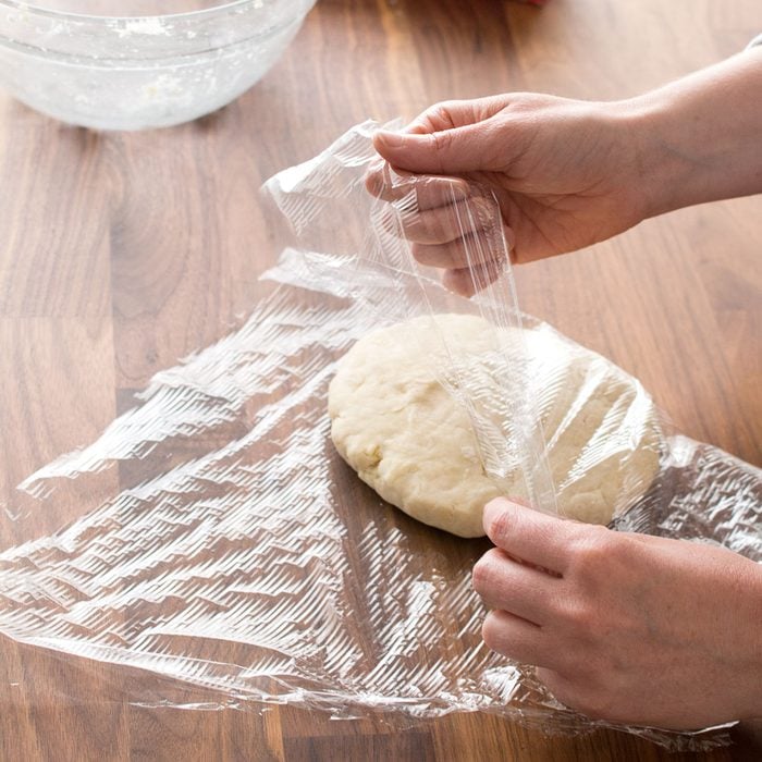 Wraping the dough in plastic paper
