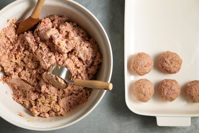 making balls out of meat mixture