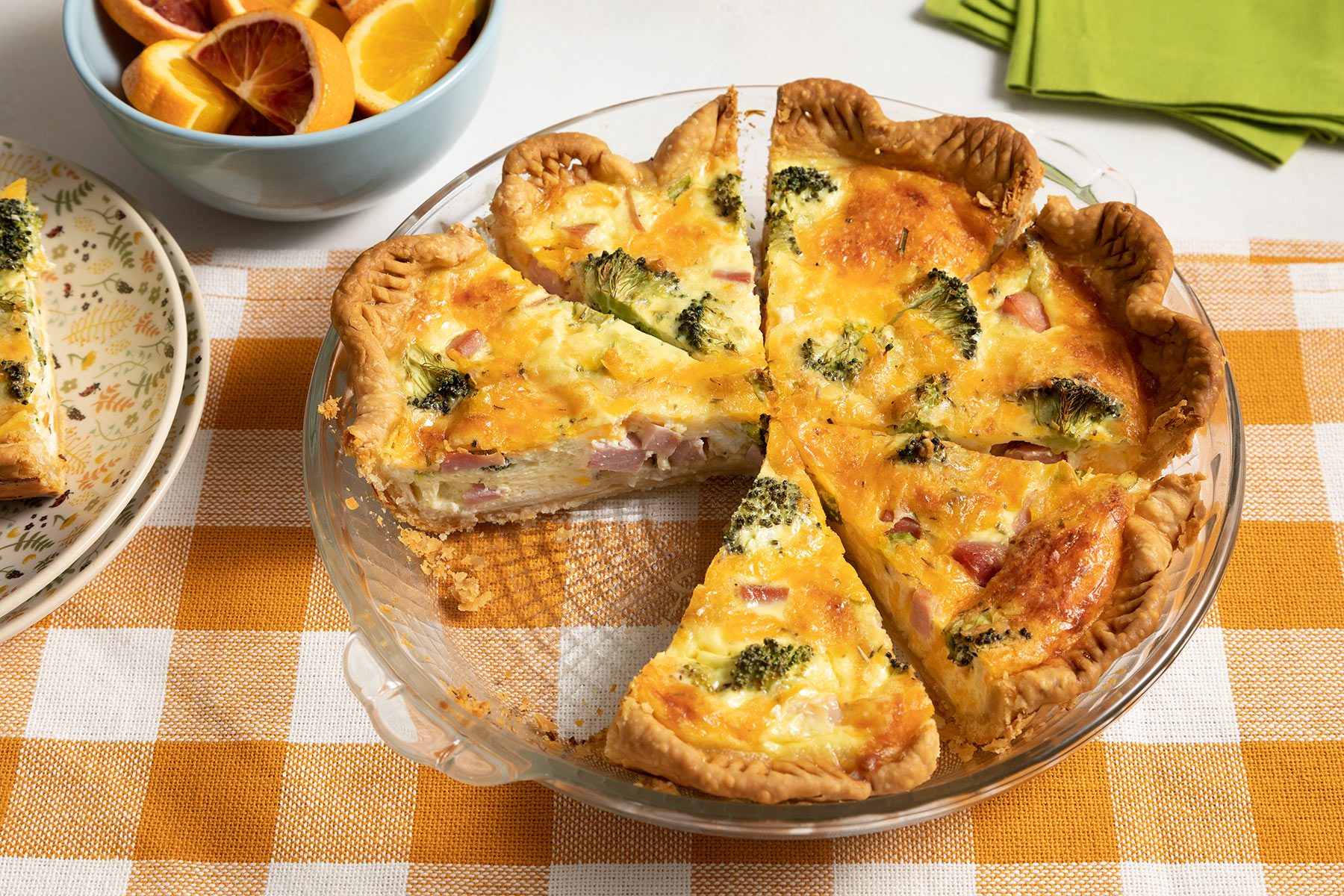 Ham And Broccoli Quiche served on glass plate 