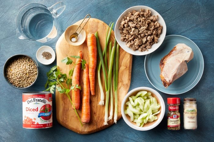 Ham Lentils Sausage and vegetables arranges on a countertop