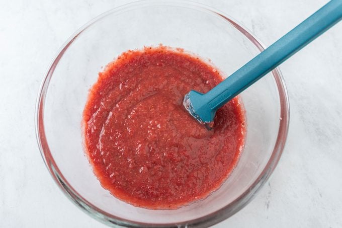 Strawberry puree in small bowl