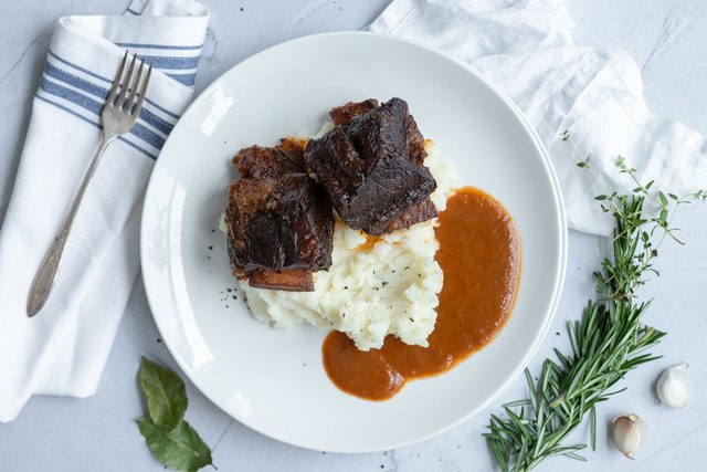 Marry Me Short Ribs served on plate with fork