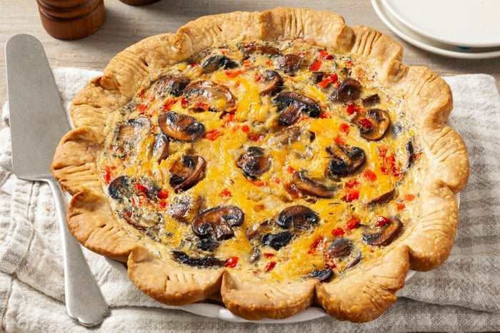 Quiche With Mushrooms on a cloth 