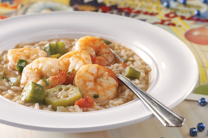 Shrimp Gumbo served in plate with spoon