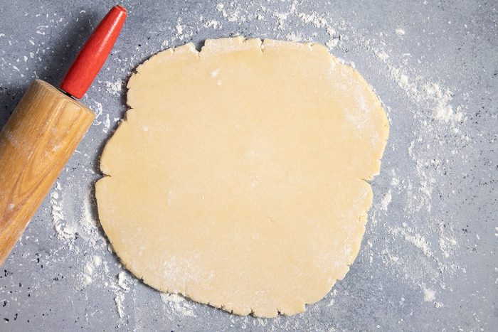 Rolling Pin and Flattened out dough on surface