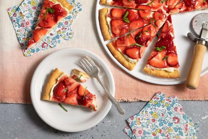 Slice of Strawberry Pizza on plate with fork