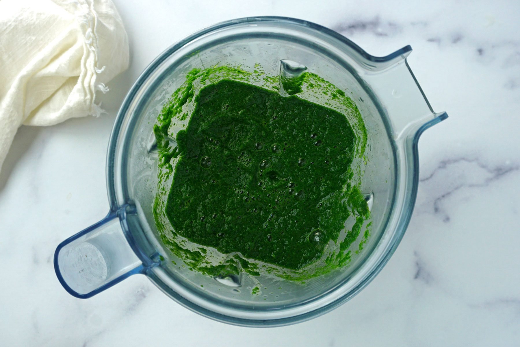Spinach and other ingredients blended in a mixture