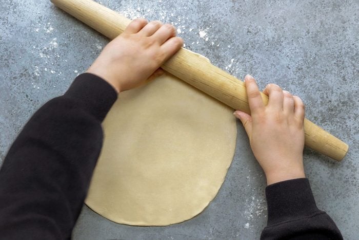 Rolling out dough with rolling pin