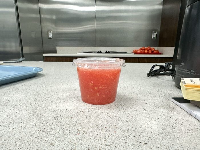 Red juice on a plastic cup