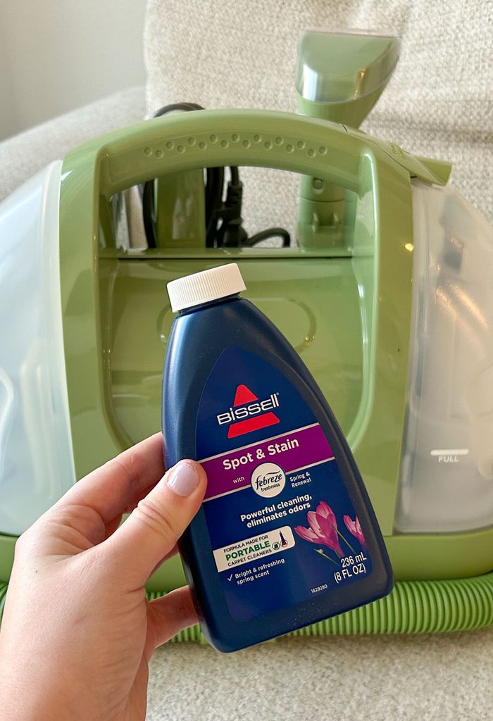 Bissell Little Green Machine with a liquid soap