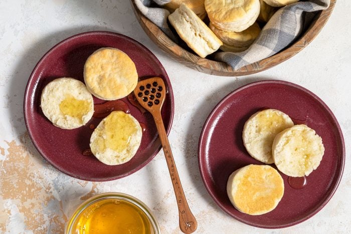 2 Ingredient Biscuits served i red plated with a honey