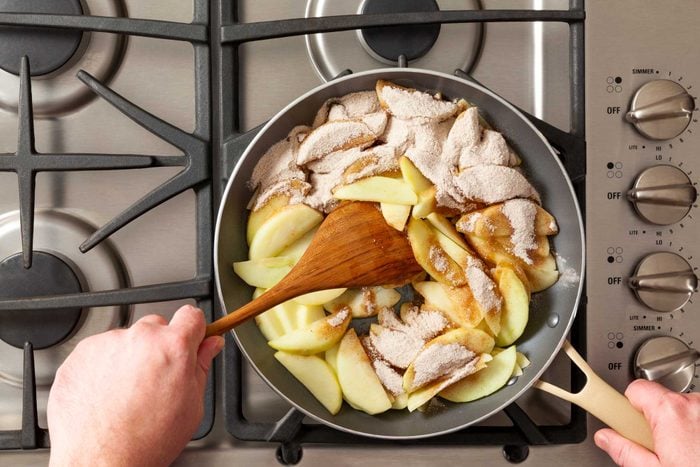 Cook the apple slices in a large skillet