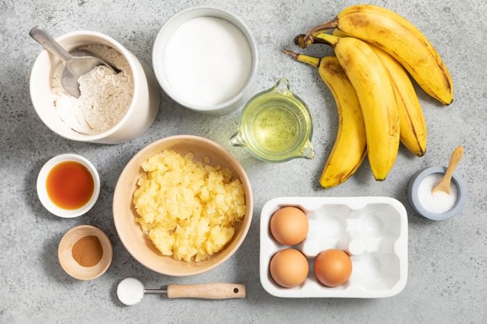 Banana Pineapple eggs and other ingredients arranged on a marble countertop 