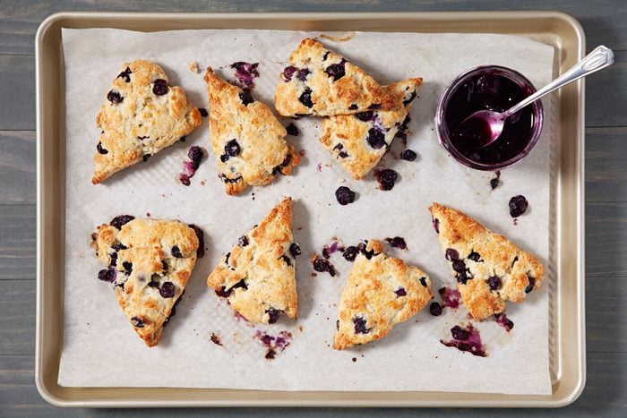 Blueberry Scones on Baking Tray on Wooden Surface