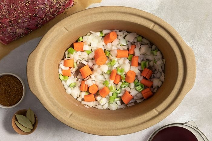 Chopped vegetables in a quart slow cooker
