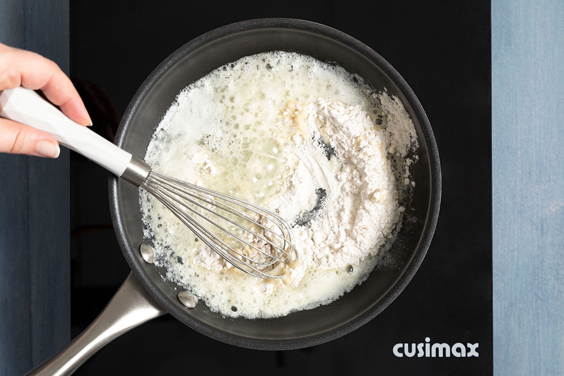 Mixing dry ingredients in skillet with butter