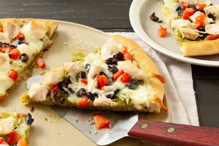 Chicken Pizza slices on a plate ready to serve