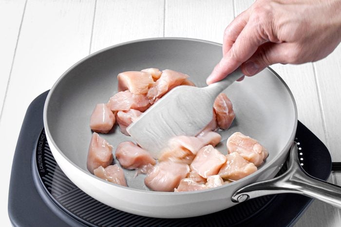 Cooking the chicken pices in a large skillet